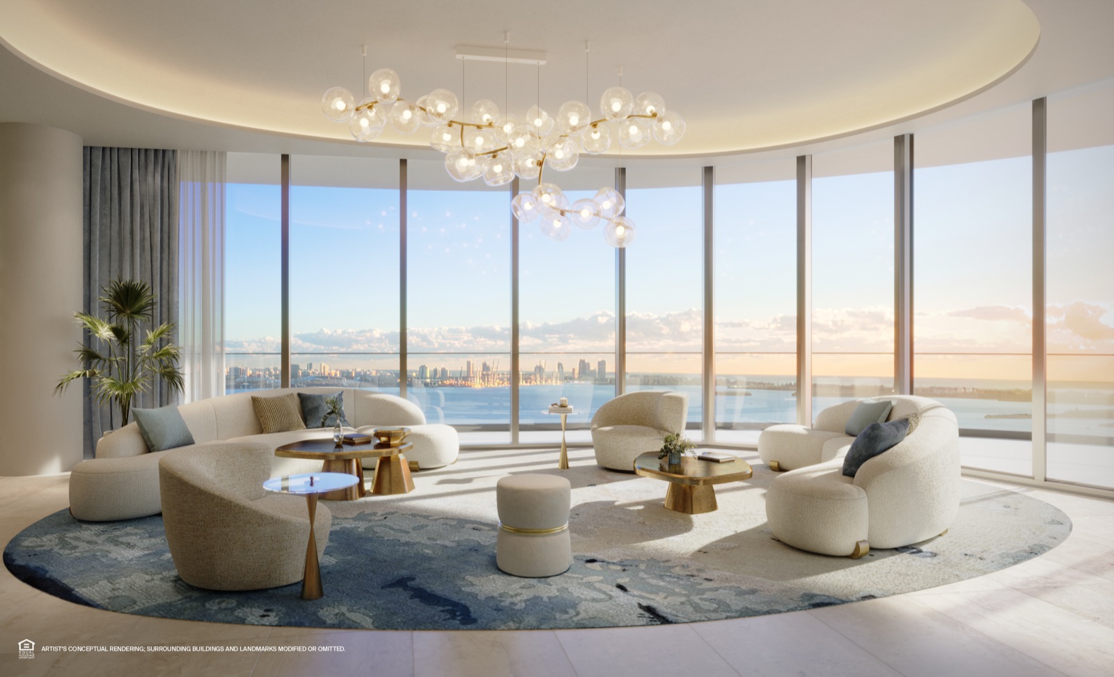 Penthouse great room with floor-to-ceiling glass.